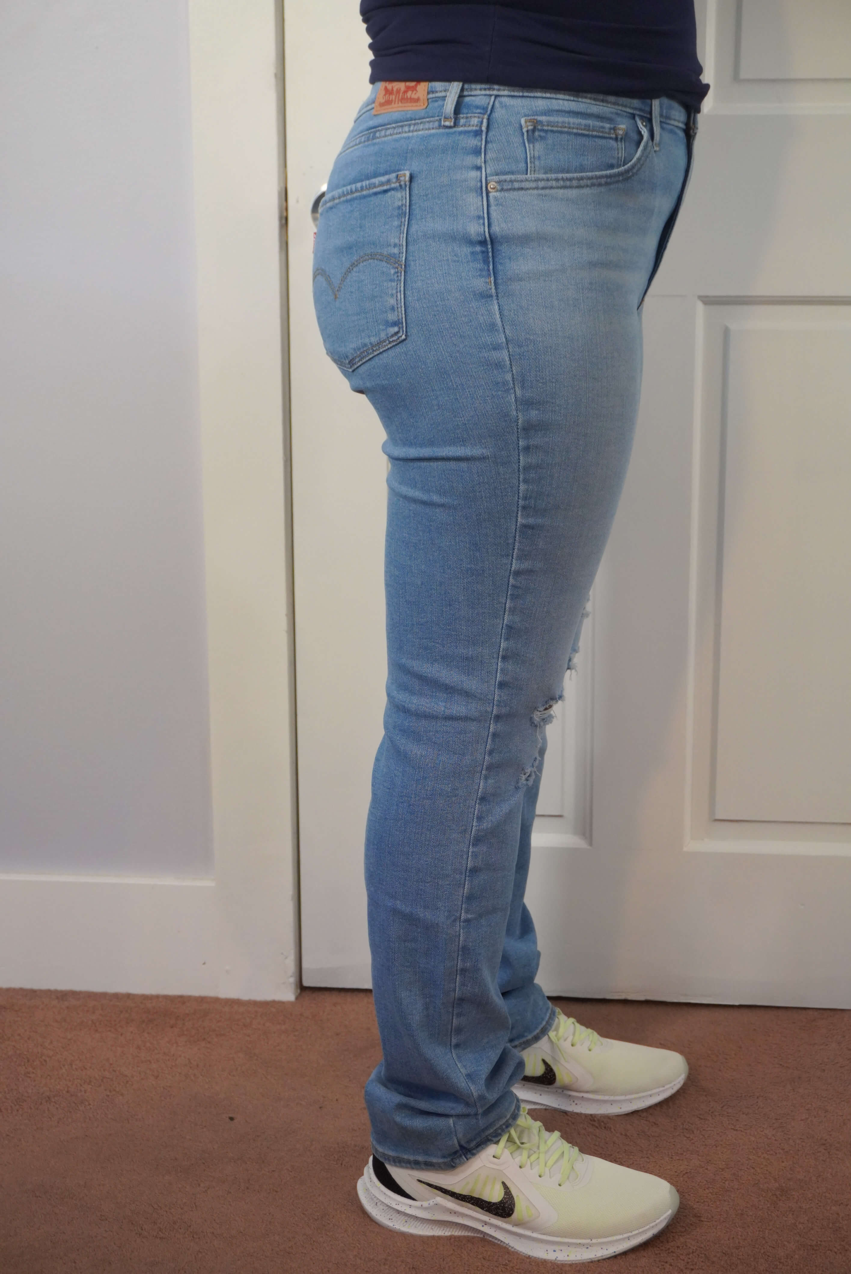 This image shows the side view of the 724 Levi's jeans. The back and front pockets of the jeans are showcased.