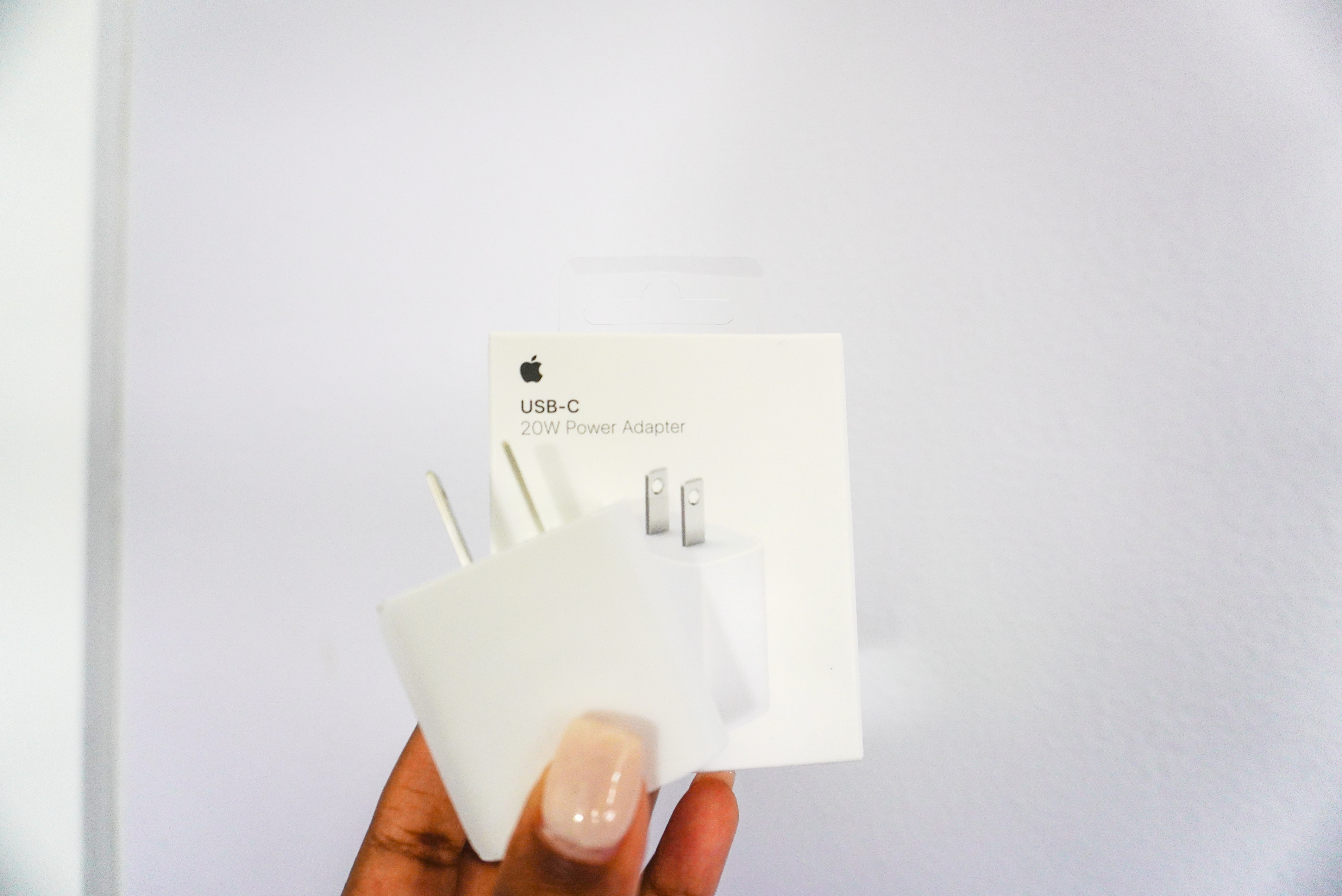 Image of Apple's white 20Watt Power Adapter.