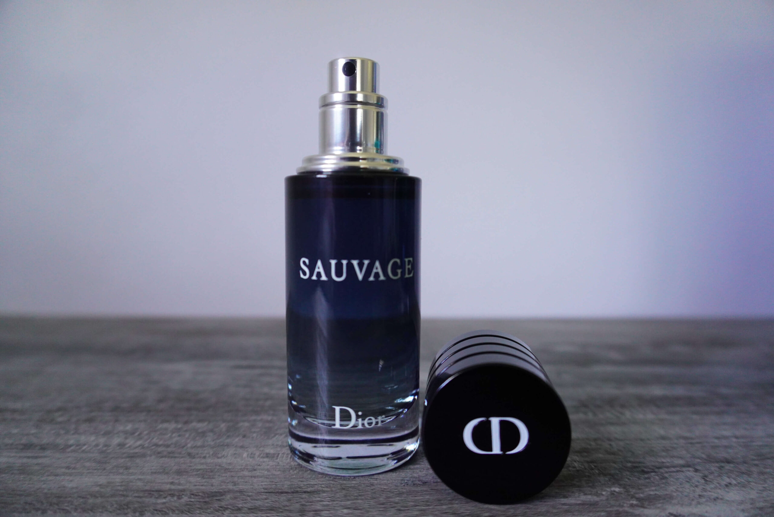Image of Dior Sauvage bottle uncapped.