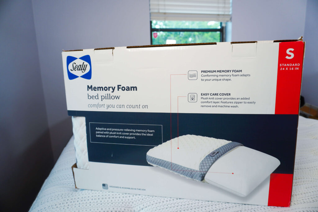 Image of the back of Sealy memory foam pillow in the box.