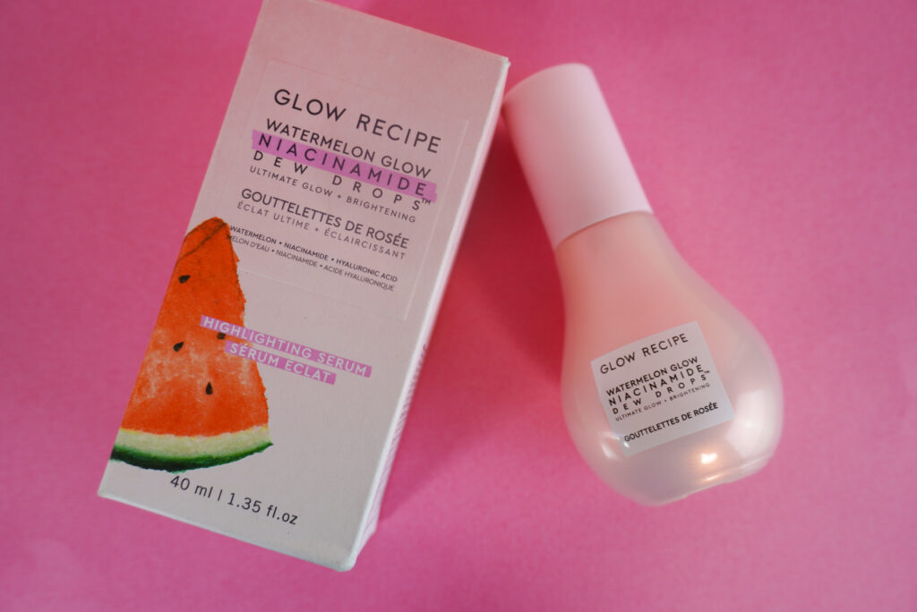 Image of the Glow Recipe Dew Drops serum bottle next to the box it comes in. 