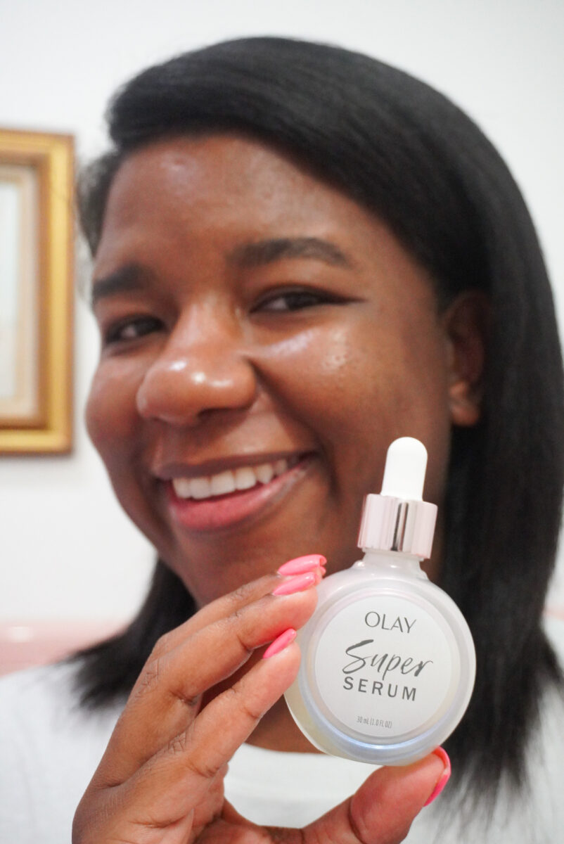 Image of me holding the Olay Super Serum.