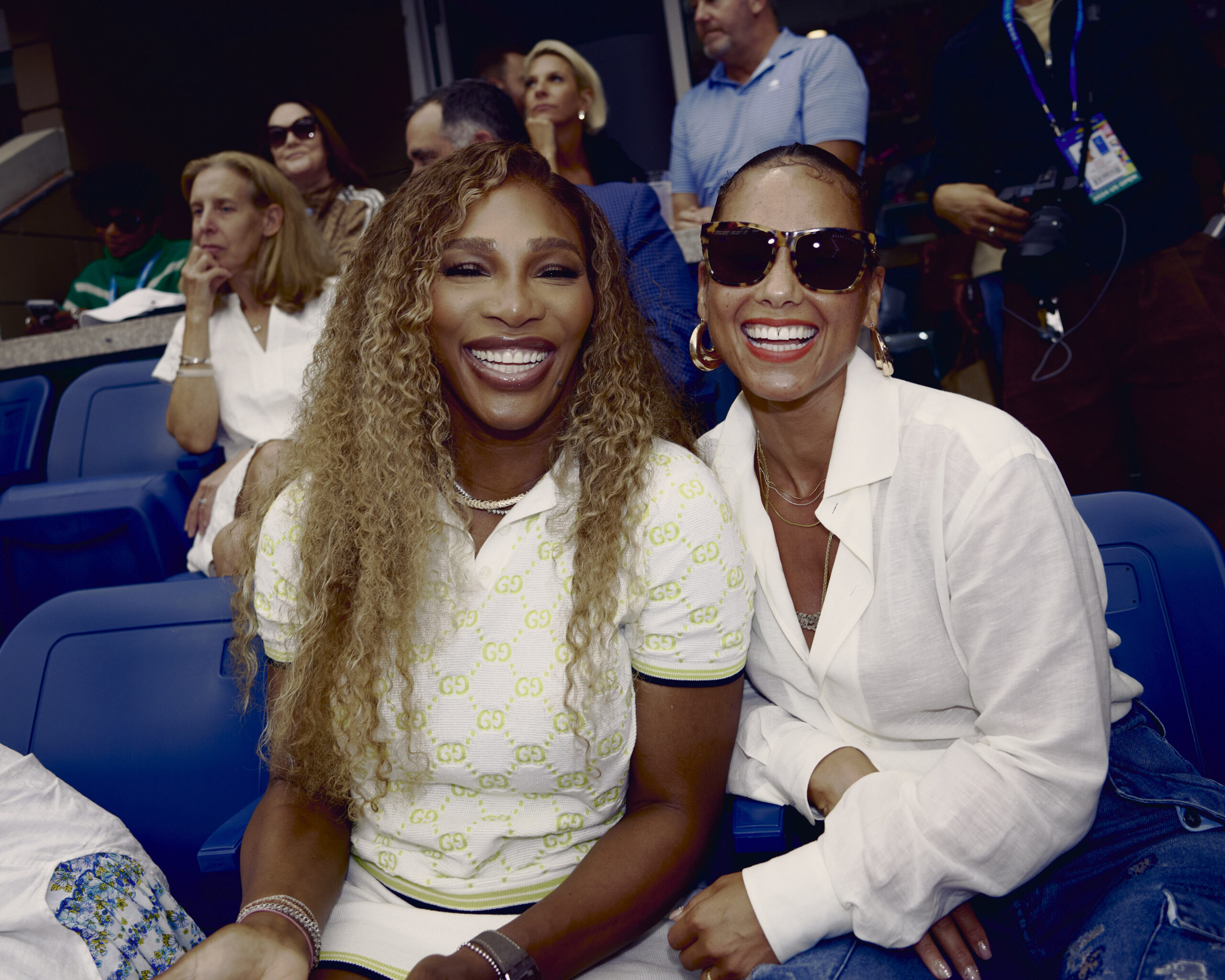 Tennis champion, Serena Williams is posing with Singer, Alicia Keys.