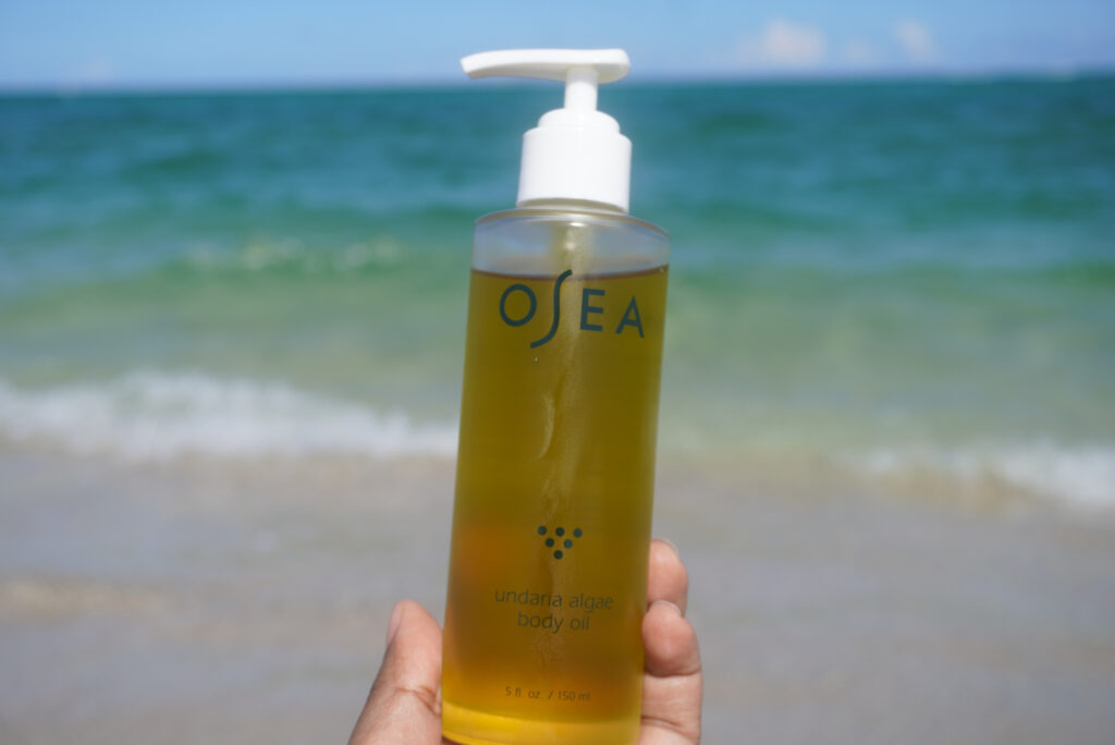 Image of me holding the OSEA Undaria Body Oil.