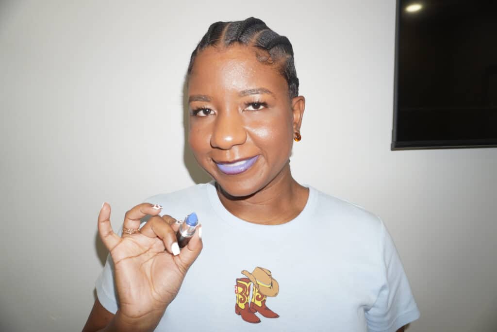 Image of me holding the MAC Tilted Denim Lipstick