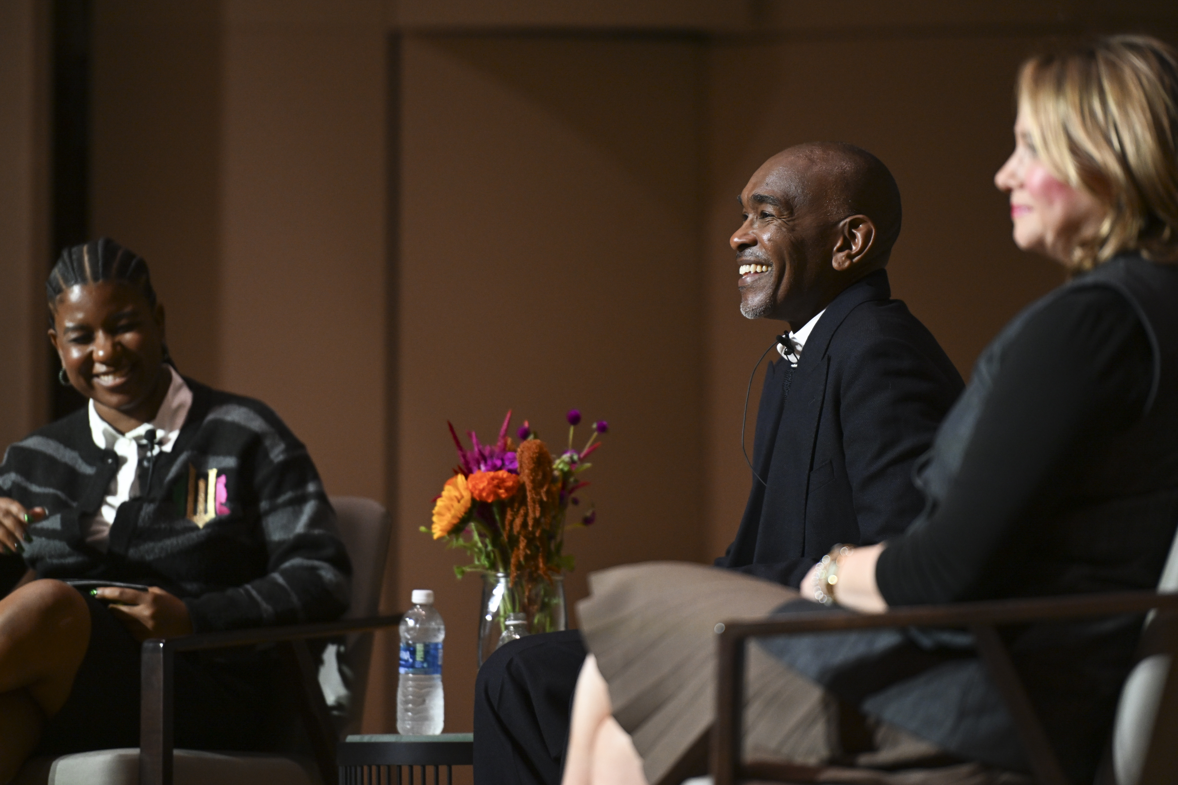 Image of me moderating a panel with Costume Designer, Paul Tazewell and Museum Director, Sarah Spinner Liska.