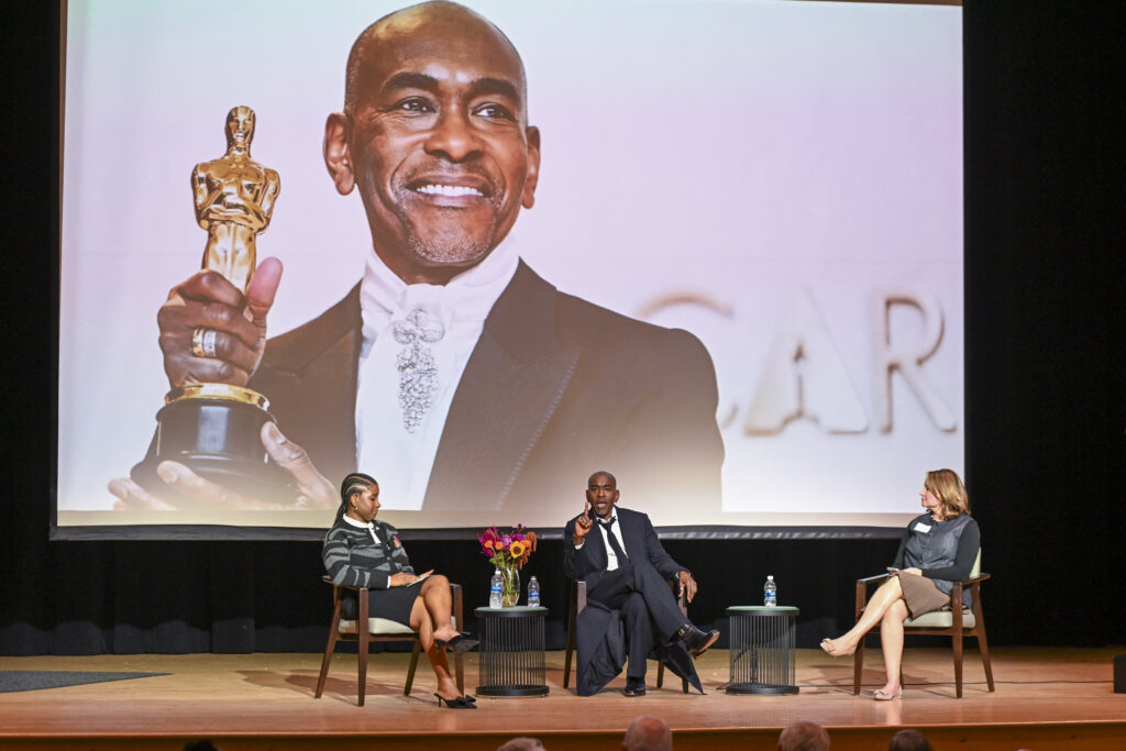 Image of me asking Costume Designer, Paul Tazewell about his Oscar-winning speech. 
