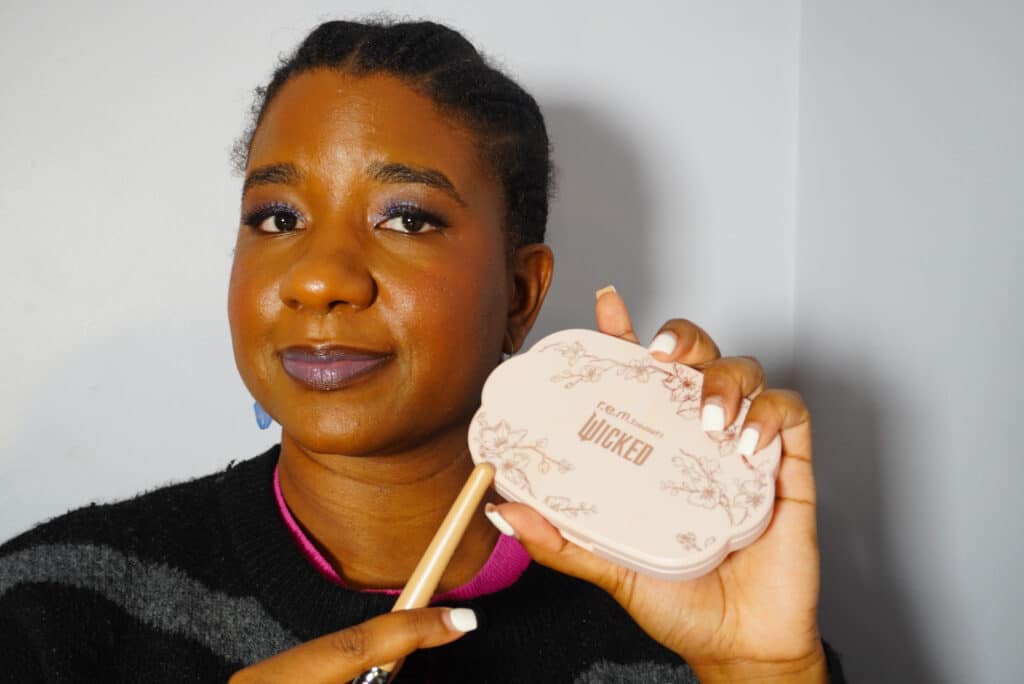 Image of me holding the Wicked x R.E.M. Beauty Cherry Blossom Blush Palette.
